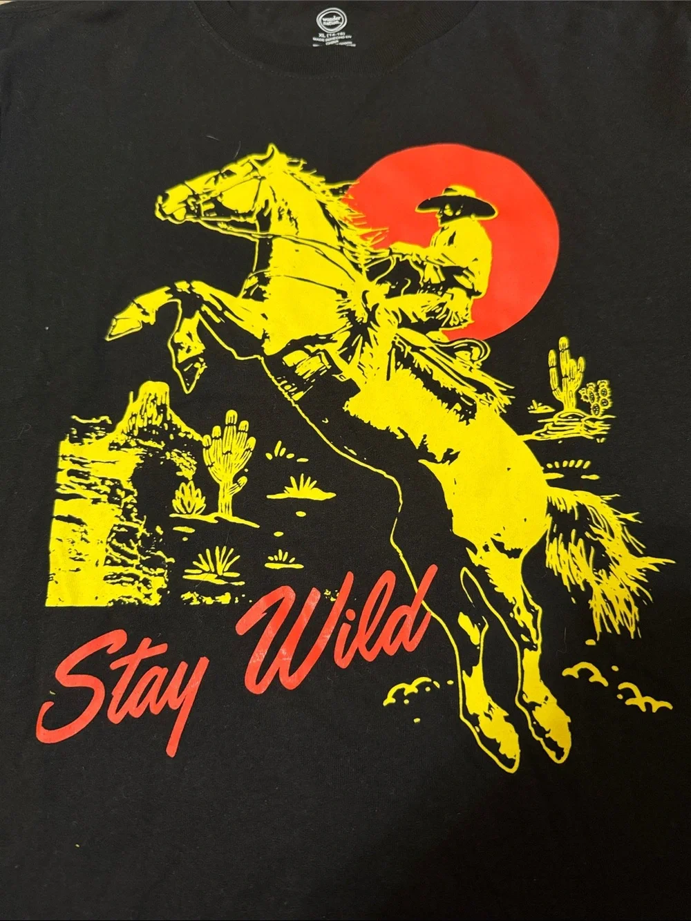 wonder nation Black Tee with‎ Yellow Cowboy & Red Sun Graphic